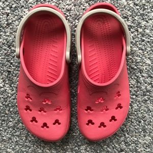 white crocs with mickey mouse holes
